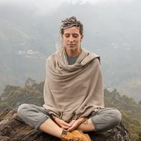 woman meditating outdoors